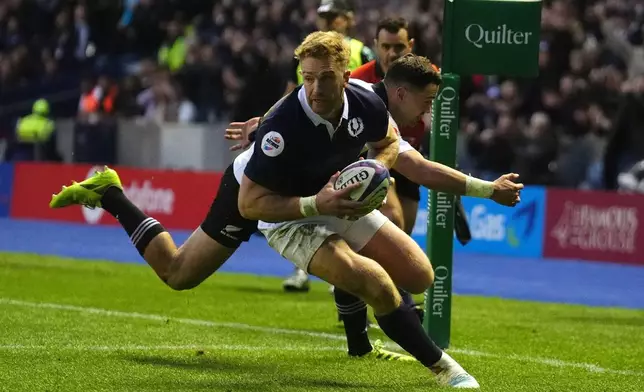 Scotland's Kyle Steyn scores their side's second try during the Quilter Nations Series rugby match between Scotland and New Zealand in Edinburgh, Scotland, Saturday, Nov. 8, 2025. (Andrew Milligan/PA via AP)