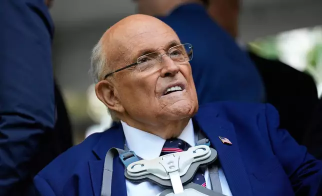 FILE - Former NYC mayor Rudy Giuliani participates in a ceremony commemorating the anniversary of the 9-11 terror attacks in New York, Thursday, Sept. 11, 2025. (AP Photo/Seth Wenig, file)