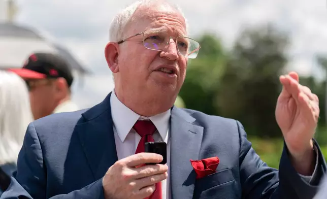 FILE - John Eastman, a California law professor speaks to reporters after the Supreme Court hearing on Birthright Citizenship outside of the Supreme Court in Washington, Thursday, May 15, 2025. (AP Photo/Jose Luis Magana, file)