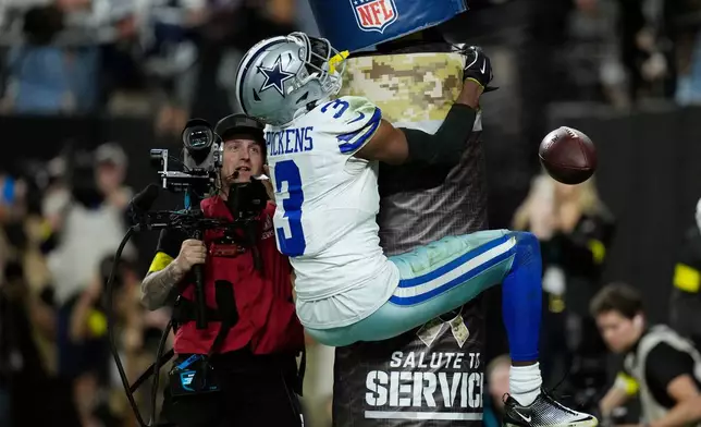 Dallas Cowboys wide receiver George Pickens celebrates his touchdown against the Las Vegas Raiders during the first half of an NFL football game Monday, Nov. 17, 2025, in Las Vegas. (AP Photo/John Locher)