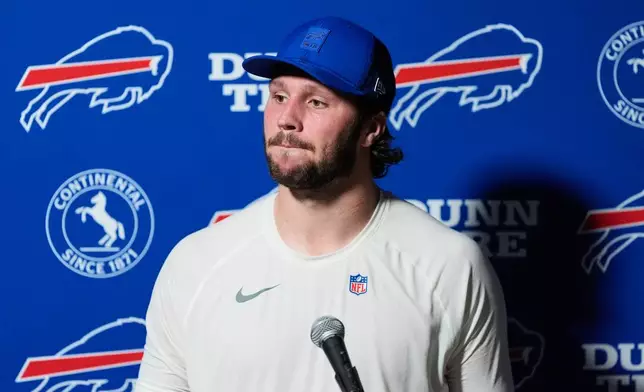 Buffalo Bills quarterback Josh Allen takes a question during a news conference after an NFL football game against the Houston Texans Thursday, Nov. 20, 2025, in Houston. (AP Photo/Ashley Landis)