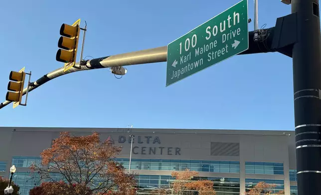 A Salt Lake City street sign leads into the city's Japantown, where the Japanese Church of Christ is one of the few remaining original buildings, Monday, Nov. 3, 2025. (AP Photo/Hannah Schoenbaum)