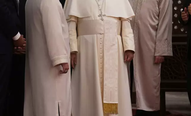 Pope Leo XIV visits the Ottoman-era Sultan Ahmed or Blue Mosque, in Istanbul, Turkey, Saturday, Nov. 29, 2025. (AP Photo/Domenico Stinellis)
