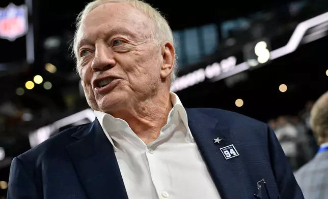 Dallas Cowboys owner Jerry Jones pauses on the field prior to an NFL football game against the Las Vegas Raiders Monday, Nov. 17, 2025, in Las Vegas. (AP Photo/David Becker)