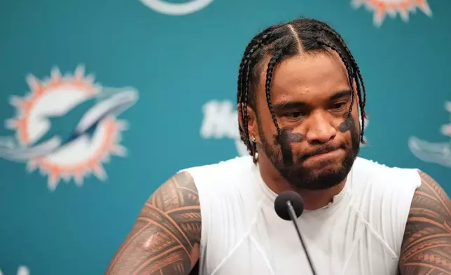 Miami Dolphins quarterback Tua Tagovailoa speaks during a press conference after an NFL football game against the Baltimore Ravens, Thursday, Oct. 30, 2025, in Miami Gardens, Fla. (AP Photo/Rebecca Blackwell)