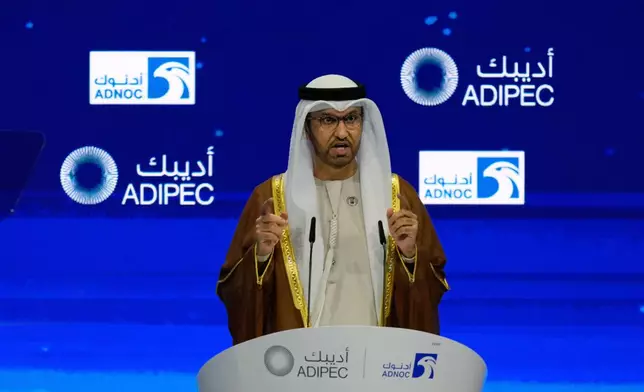 UAE Minister of Industry and Advanced Technology and Managing Director of state-run Abu Dhabi National Oil Co. (ADNOC) Sultan al-Jaber speaks during the inaugural session of annual Abu Dhabi International Petroleum Exhibition and Conference (ADIPEC) in Abu Dhabi, United Arab Emirates, Monday, Nov. 3, 2025. (AP Photo/Altaf Qadri)
