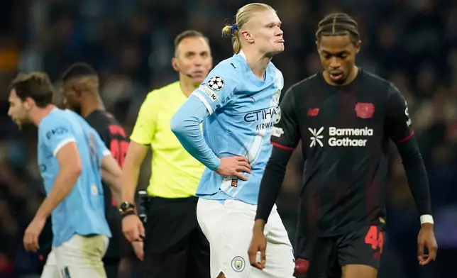 Manchester City's Erling Haaland reacts after he missed a chance to score during the Champions League opening phase soccer match between Manchester City and Bayer Leverkusen in Manchester, England, Tuesday, Nov. 25, 2025. (AP Photo/Dave Thompson)