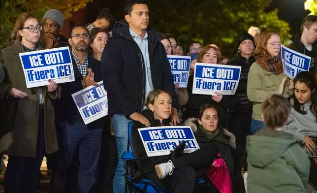 Hundreds of community members, parents, and elected officials attend a rally at Northcenter Town Square, in support of "Ms. Diana" an educator who was detained by federal law enforcement officers at Rayito de Sol Spanish Immersion Early Learning Center this morning, Wednesday, Nov. 5, 2025, in Chicago. (Tyler Pasciak LaRiviere/Chicago Sun-Times via AP)