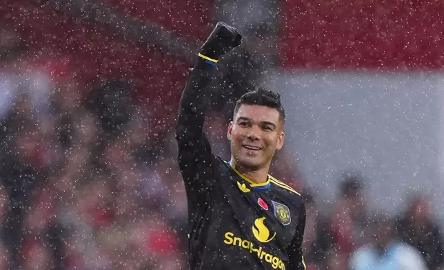 Manchester United's Casemiro celebrates scoring during the English Premier League match between Nottingham Forest and Manchester United in Nottingham, England, Saturday Nov. 1, 2025. (Bradley Collyer/PA via AP)