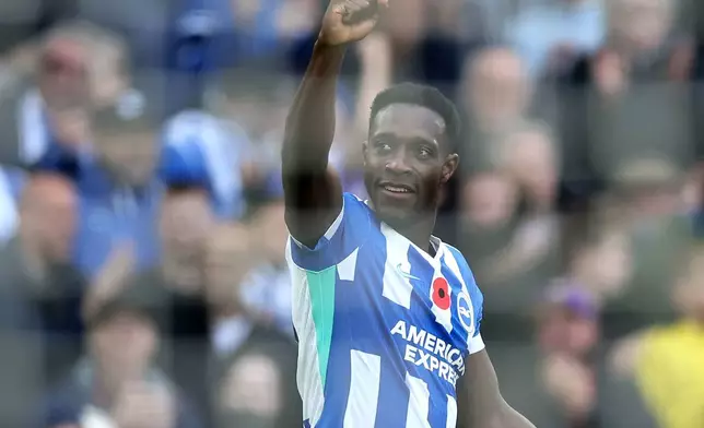 Brighton and Hove Albion's Danny Welbeck celebrates scoring during the English Premier League soccer match between Brighton and Hove Albion and Leeds United in Brighton, England, Saturday Nov. 1, 2025. (Steven Paston/PA via AP)