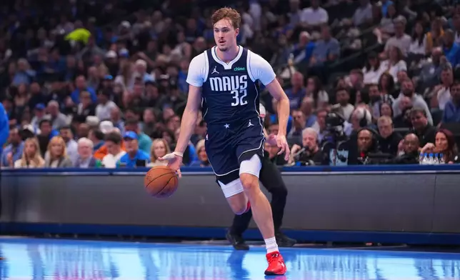 Dallas Mavericks forward Cooper Flagg drives to the basket against the Los Angeles Clippers during the first half of an NBA Cup basketball game Friday, Nov. 14, 2025, in Dallas. (AP Photo/Julio Cortez)