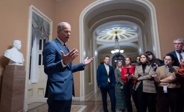 Senate Majority Leader John Thune, R-S.D., speaks to reporters after final Senate passage of the stopgap funding bill to reopen the government through Jan. 30, at the Capitol in Washington, Monday evening, Nov. 10, 2025. (AP Photo/J. Scott Applewhite)