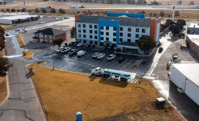 The scene of an ammonia spill at the Holiday Inn Express in Weatherford, Okla. on Thursday, Nov. 13, 2025. (AP Photo/Alonzo Adams)