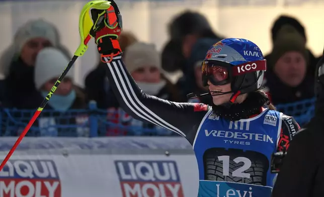 Albania's Lara Colturi celebrates her second place in a alpine ski, women's World Cup slalom, in Levi, Finland, Saturday, Nov. 15, 2025. (AP Photo/Marco Trovati)