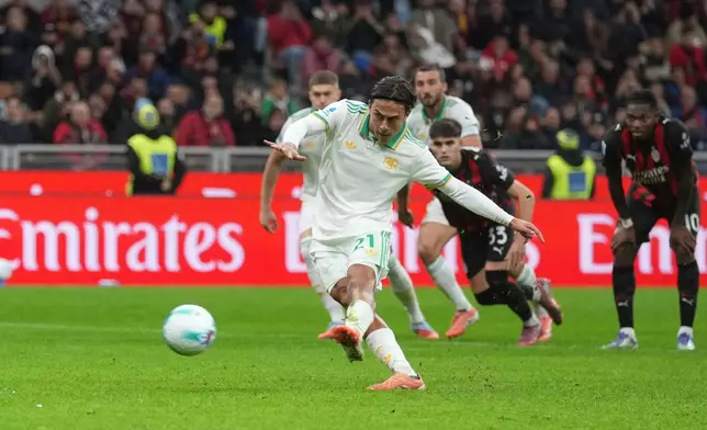 Roma's Paulo Dybala misses to score the penalty during the Serie A soccer match between AC Milan and Roma in Milan, Italy, Sunday, Nov. 2, 2025. (AP Photo/Antonio Calanni)
