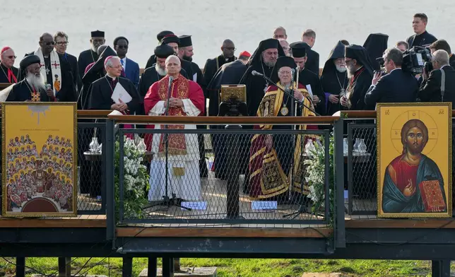 Pope Leo XIV and the Ecumenical Patriarch Bartholomew I lead an Ecumenical prayer service near the archaeological excavations of the ancient Basilica of Saint Neophytos, in Iznik, Turkey, Friday, Nov. 28, 2025. (AP Photo/Domenico Stinellis)