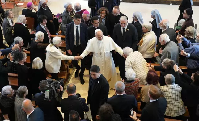 Pope Leo XIV visits the nursing home of the Little Sisters of the Poor, in Istanbul, Turkey, Friday, Nov. 28, 2025. (AP Photo/Domenico Stinellis)