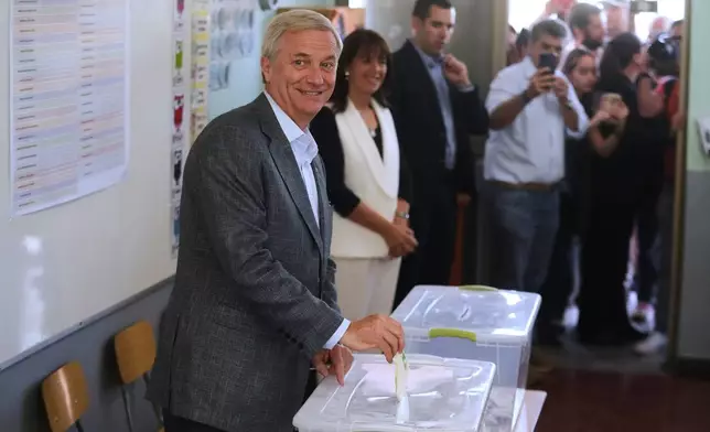 Presidential candidate Jose Antonio Kast of the Republican Party votes during general elections in Santiago, Chile, Sunday, Nov. 16, 2025. (AP Photo/Esteban Felix)