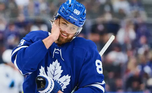 Toronto Maple Leafs' William Nylander (88) reacts as he skates on a break in the play during the third period of a NHL hockey game against the Utah Mammoth in Toronto, Wednesday, Nov. 5, 2025. (Sammy Kogan/The Canadian Press via AP)