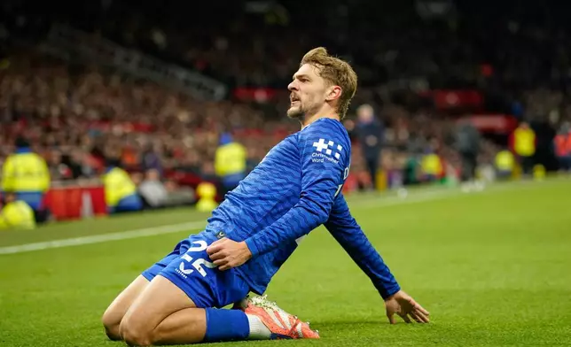 Everton's Kiernan Dewsbury-Hall celebrates after scoring the opening goal during the English Premier League soccer match between Manchester United and Everton in Manchester, England, Monday, Nov. 24, 2025. (AP Photo/Dave Thompson)