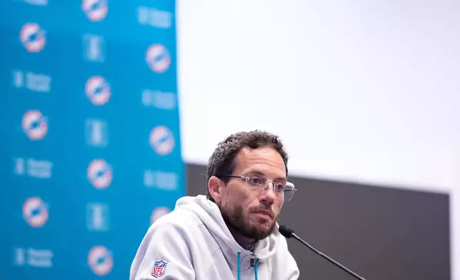 Miami Dolphins head coach Mike McDaniel attends a press conference in Madrid, Spain, Wednesday, Nov. 12, 2025, ahead of Sunday's NFL football game against Washington Commanders. (AP Photo/Manu Fernandez)
