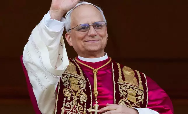 FILE - Newly elected Pope Leo XIV appears at the balcony of St. Peter's Basilica at the Vatican, May 8, 2025. (AP Photo/Alessandra Tarantino, File)