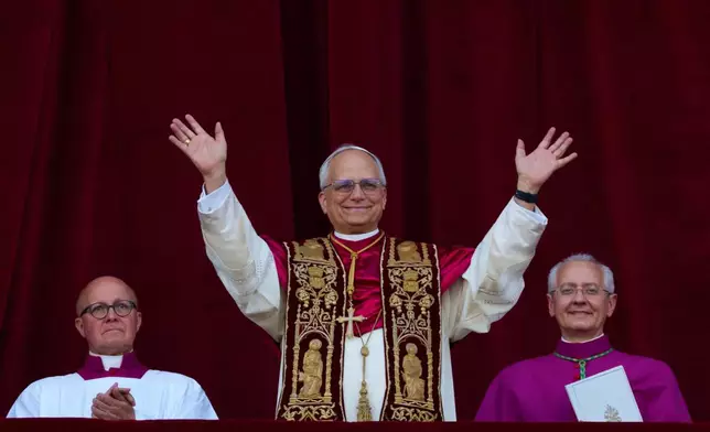 FILE- Newly elected Pope Leo XIV appears at the balcony of St. Peter's Basilica at the Vatican, May 8, 2025. (AP Photo/Alessandra Tarantino, File)