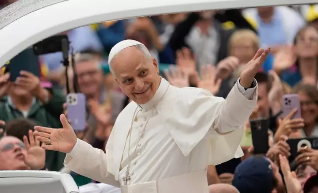 FILE - Pope Leo XIV arrives for his weekly general audience in St. Peter's Square, at the Vatican, Sept. 10, 2025. (AP Photo/Gregorio Borgia, File)