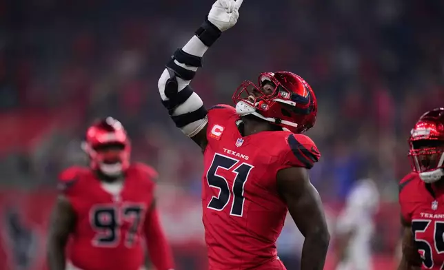 Houston Texans defensive end Will Anderson Jr. (51) celebrates after Buffalo Bills' Josh Allen (17) was sacked in the second half of an NFL football game Thursday, Nov. 20, 2025, in Houston. (AP Photo/Eric Christian Smith)