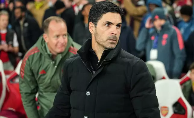 Arsenal's manager Mikel Arteta arrives for the Champions League opening phase soccer match between Arsenal and Bayern Munich in London, Wednesday, Nov. 26, 2025. (AP Photo/Kin Cheung)