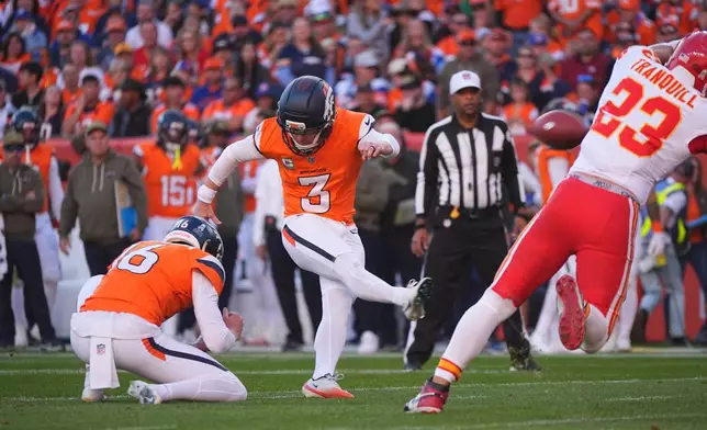 Denver Broncos place kicker Wil Lutz (3) makes a field goal during the first half an NFL football game Kansas City Chiefs Sunday, Nov. 16, 2025, in Denver. (AP Photo/David Zalubowski)