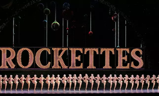 FILE- The Radio City Rockettes perform in the annual "Radio City Christmas Spectacular," marking its 75th year in New York, Nov. 14, 2007. (AP Photo/Bebeto Matthews, File)