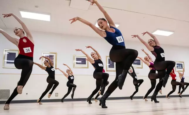 FILE - Dancers perform during auditions to become Radio City Rockettes at Radio City Music Hall, on April 3, 2024, in New York. (AP Photo/Brittainy Newman, File)