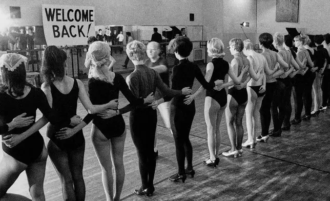 FILE - Rockettes line up for their first rehearsal as they prepare to go back onstage after a 27-day strike and under a new agreement, at Radio City Music Hall, Oct. 13, 1967, in New York. (AP Photo/Anthony Camerano, File)