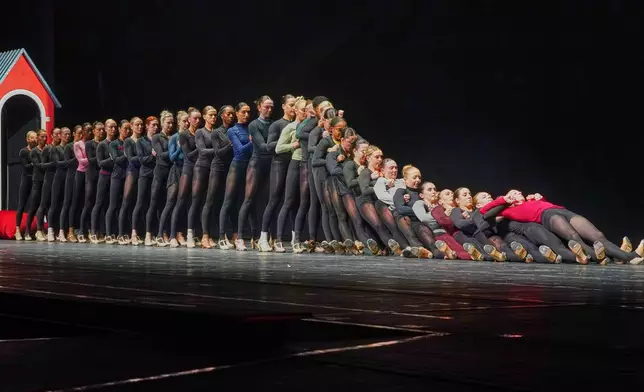 The Rockettes rehearse the "Parade of the Wooden Soldiers," a number in which the costumed dancers march in military-like precision and then famously collapse like dominoes, in the Christmas Spectacular at Radio City Music Hall, in New York, Thursday, Oct. 30, 2025. (AP Photo/Richard Drew)