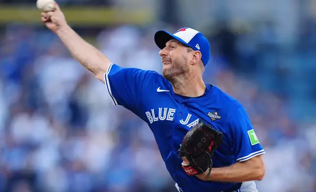 Toronto Blue Jays pitcher Max Scherzer delivers against the Los Angeles Dodgers during the first inning in Game 3 of baseball's World Series in Los Angeles, Monday, Oct. 27, 2025. (Frank Gunn/The Canadian Press via AP)
