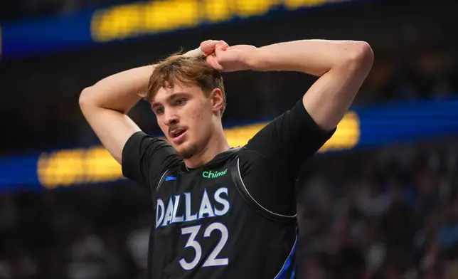 Dallas Mavericks forward Cooper Flagg reacts after a play against the Portland Trail Blazers during the first half of an NBA basketball game Sunday, Nov. 16, 2025, in Dallas. (AP Photo/Julio Cortez)