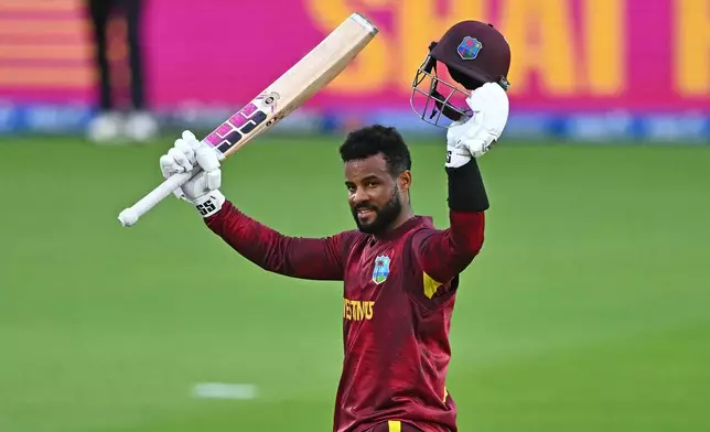 West Indies' Shai Hope celebrates making 100 runs against New Zealand during their One Day International cricket match in Napier, New Zealand, Wednesday Nov. 19, 2025. (Kerry Marshall/Photosport via AP)