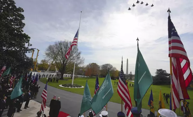U.S. Air Force jets flyover as President Donald Trump welcomes Saudi Arabia's Crown Prince Mohammed bin Salman to the White House, Tuesday, Nov. 18, 2025, in Washington. (AP Photo/Alex Brandon)