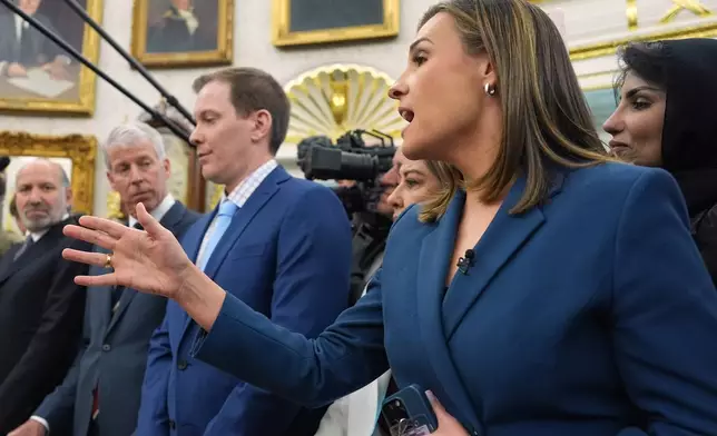 ABC News reporter Mary Bruce asks a question as President Donald Trump meets Saudi Arabia's Crown Prince Mohammed bin Salman in the Oval Office of the White House, Tuesday, Nov. 18, 2025, in Washington. (AP Photo/Evan Vucci)