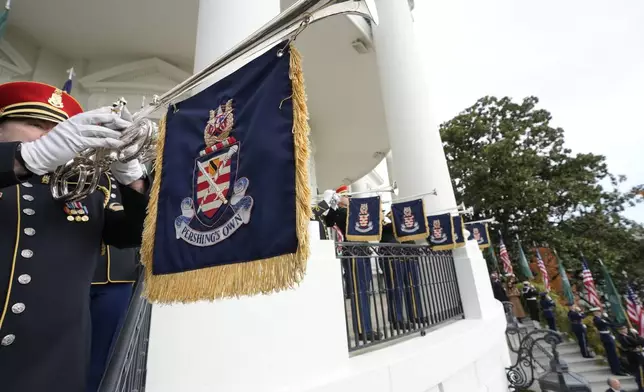 The U.S. Army Herald Trumpets play as President Donald Trump welcomes Saudi Arabia's Crown Prince Mohammed bin Salman to the White House, Tuesday, Nov. 18, 2025, in Washington. (AP Photo/Alex Brandon)