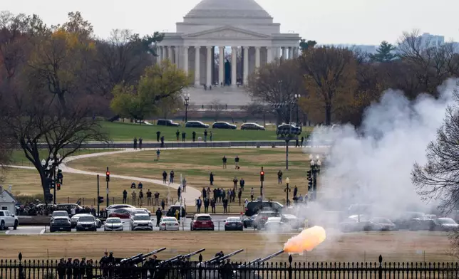 Canons fire as President Donald Trump welcomes Saudi Arabia's Crown Prince Mohammed bin Salman to the White House, Tuesday, Nov. 18, 2025, in Washington. (AP Photo/Alex Brandon)