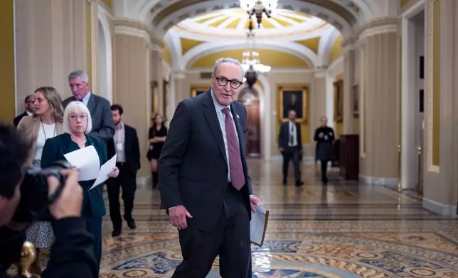 Senate Minority Leader Chuck Schumer, D-N.Y., arrives to meet with reporters following a closed-door session with fellow Democrats, on day 35 of the government shutdown, at the Capitol in Washington, Tuesday, Nov. 4, 2025. (AP Photo/J. Scott Applewhite)