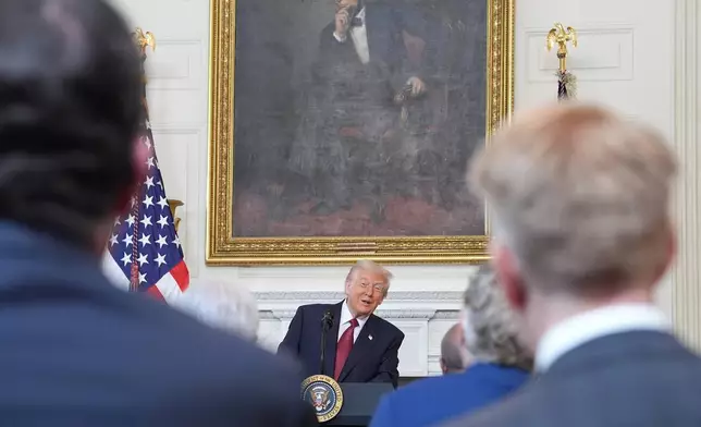 President Donald Trump speaks during a breakfast with Senate and House Republicans in the State Dining Room of the White House, Wednesday, Nov. 5, 2025, in Washington. (AP Photo/Evan Vucci)
