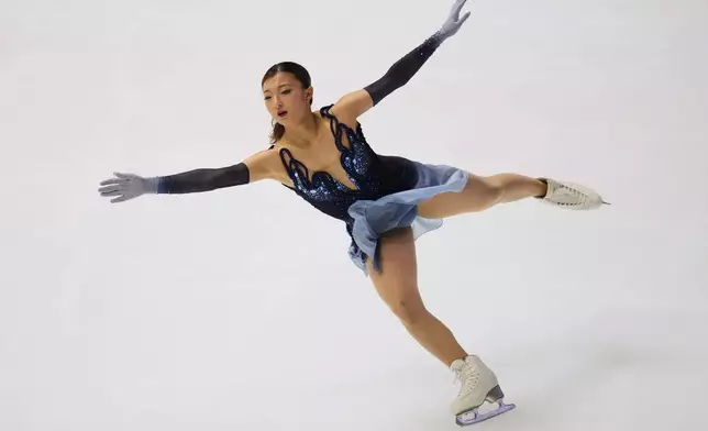 Kaori Sakamoto of Japan performs during the women's short program in the ISU Grand Prix of Figure Skating - NHK Trophy in Kadoma, east of Osaka, western Japan, Friday, Nov. 7, 2025. (AP Photo/Hiro Komae)