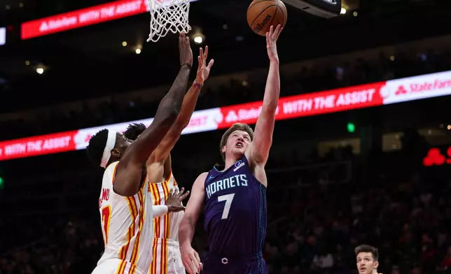 Charlotte Hornets guard Kon Knueppel (7) shoots during the first half of an NBA basketball game against the Atlanta Hawks, Sunday, Nov. 23, 2025, in Atlanta. (AP Photo/Colin Hubbard)
