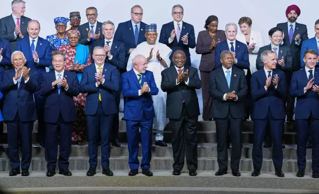 Heads of states gather for a group photo during the G20 leaders' summit, in Johannesburg, South Africa, Saturday, Nov. 22, 2025. (AP Photo/Misper Apawu,Pool)