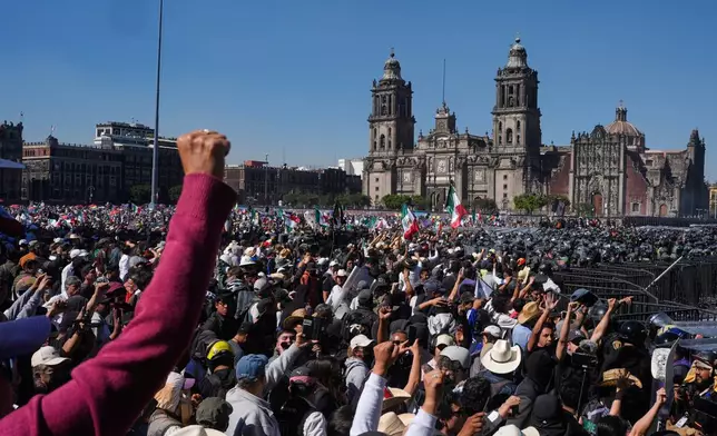 Protesters take part in a youth anti-government march in Mexico City, Saturday, Nov. 15, 2025. (AP Photo/Marco Ugarte)