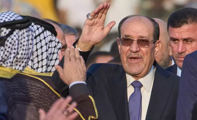 Former Iraqi Prime Minister Nouri al-Maliki arrives to his political block campaign rally before the parliamentary elections in Baghdad, Iraq, Friday, Nov. 7, 2025. (AP Photo/Hadi Mizban)