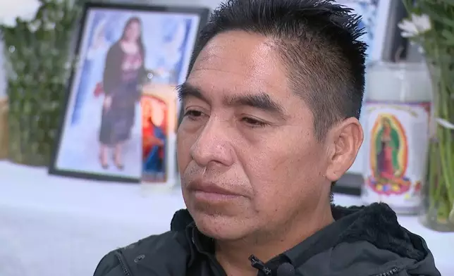 CORRECTS LAST NAMES OF BOTH PEOPLE - In this image from video provided by WRTV, husband of Maria Florinda Rios Perez, Mauricio Velasquez, speaks during an interview in Indianapolis on Thursday, Nov. 7, 2025. (WRTV via AP)